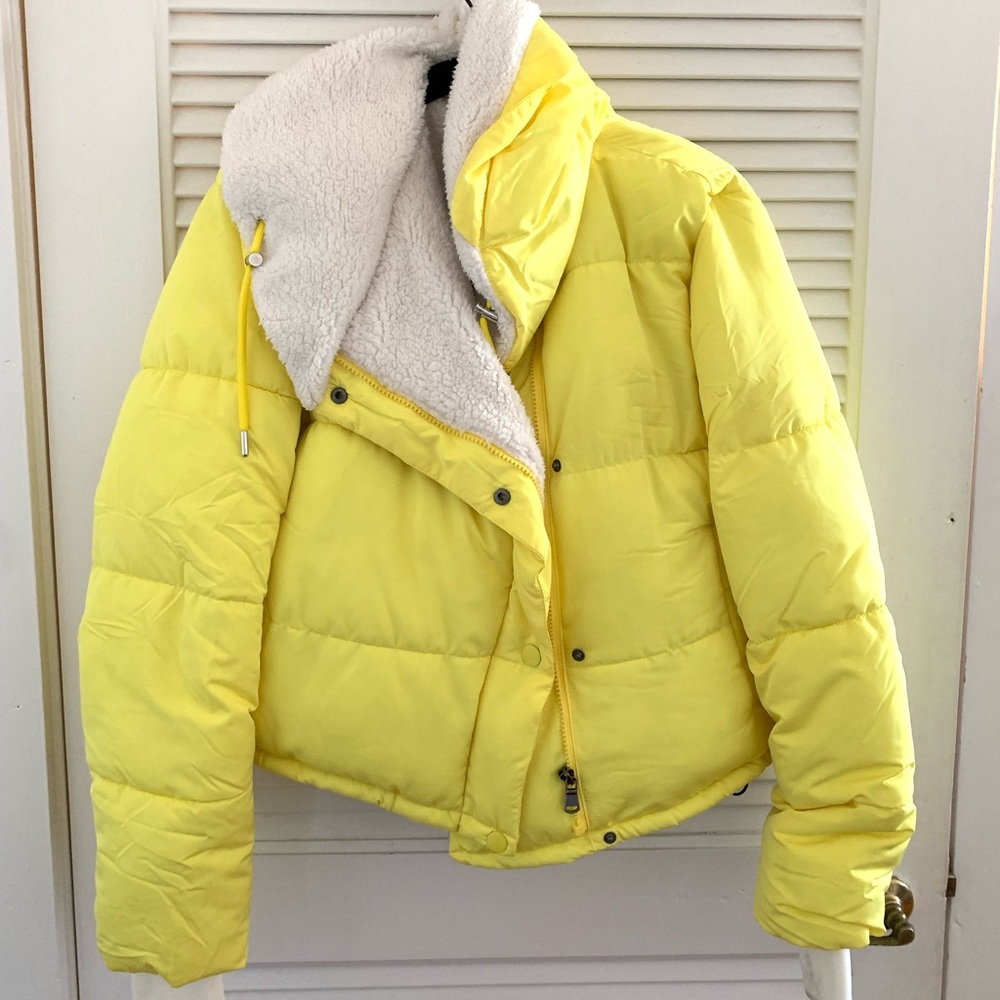 Yellow Urban Outfitters (BDG) puffer jacket with Sherpa lining on inside